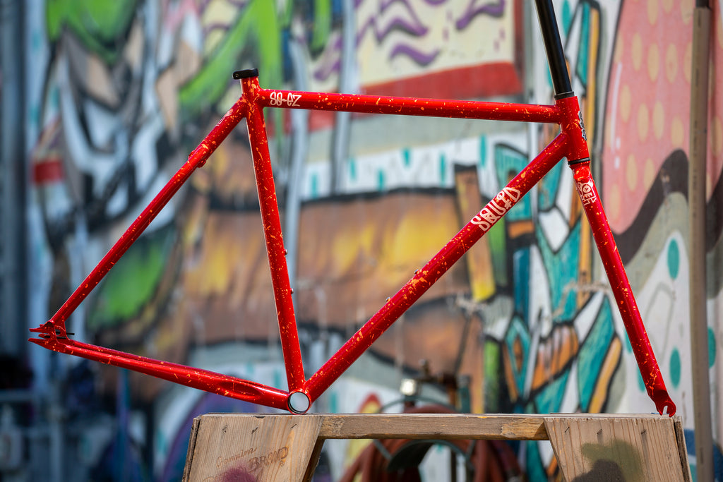 Red and Fluro Orange Splatter SO-EZ – Squid Bikes